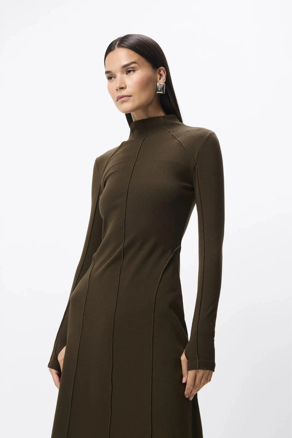 Amal Midi Dress Olive by Mossman – stretch jersey midi dress with long sleeves, thumbholes and A-line skirt.