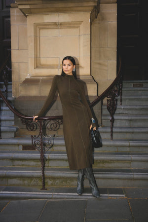 Amal Midi Dress Olive by Mossman – stretch jersey midi dress with long sleeves, thumbholes and A-line skirt.