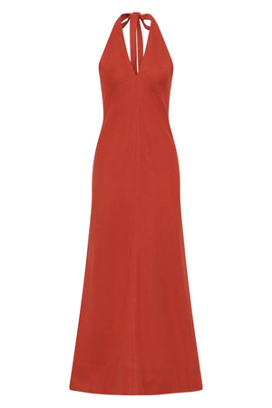 Amara Midi Dress by Faithfull the Brand — a dusty tomato linen halter dress with an open back and flowing bias-cut skirt, perfect for warm vacations.