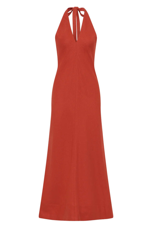 Amara Midi Dress by Faithfull the Brand — a dusty tomato linen halter dress with an open back and flowing bias-cut skirt, perfect for warm vacations.