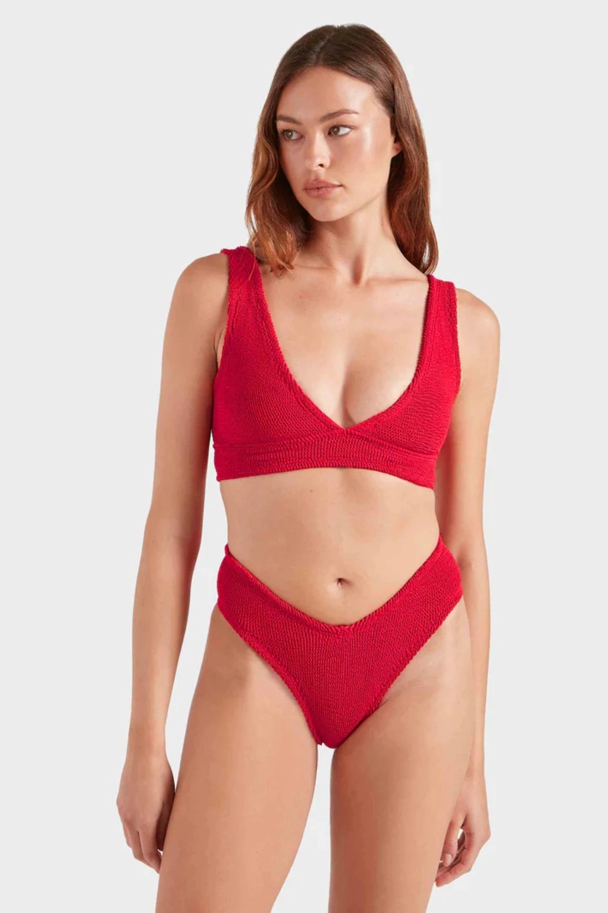 Angel Bikini in Red by Hunza G, supportive underband top and V-waist bottoms in metallic crinkle fabric. Perfect for confident summer days.