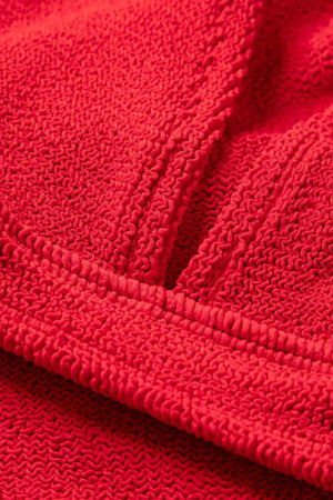 Angel Bikini in Red by Hunza G, supportive underband top and V-waist bottoms in metallic crinkle fabric. Perfect for confident summer days.