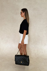 Anna Top Black by Sneaky Link – a cropped boxy top with V neckline and structured fit. Perfect for modern everyday styling.