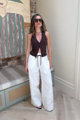 Annie Halter Top Chocolate by Sneaky Link – a fitted top with button front and soft stretch. Perfect for everyday styling.