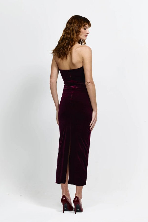 Annora Dress in Wine by Effie Kats, a strapless velvet dress with plunging V-neckline, cinched waist, and mid-length hem for a bold, elegant look.