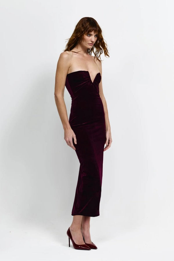 Annora Dress in Wine by Effie Kats, a strapless velvet dress with plunging V-neckline, cinched waist, and mid-length hem for a bold, elegant look.
