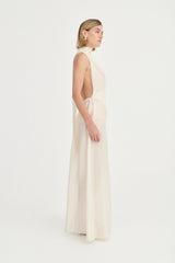 Antonella Dress Ivory Leaf by Solaqua – halter maxi dress with wrap bodice and fluid floor-length skirt.