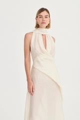 Antonella Dress Ivory Leaf by Solaqua – halter maxi dress with wrap bodice and fluid floor-length skirt.