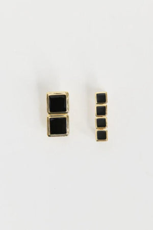 Archer Drop Earrings in Gold – mismatched gold PVD-plated earrings with black enamel drops, perfect for sleek day-to-night styling.