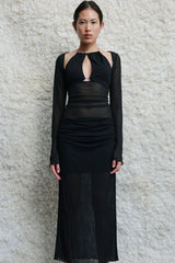 Ari Cut Away Dress Black by Benni – a mesh maxi with halter cutouts and long sleeves. Perfect for bold evening styling.