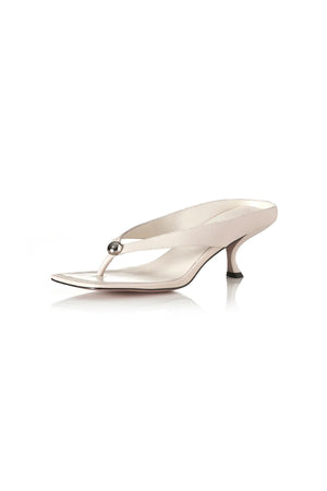 Aria Bone Oily Leather by Alias Mae, leather thong sandal with stud detail and 6cm curved heel, a trendy piece perfect for summer or polished styling.