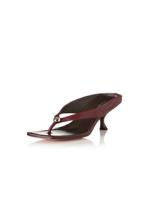 Aria Burgundy Oily Leather by Alias Mae, thong sandal with stud accents and 6cm curved heel, a trendy piece perfect for everyday chic or evenings out.