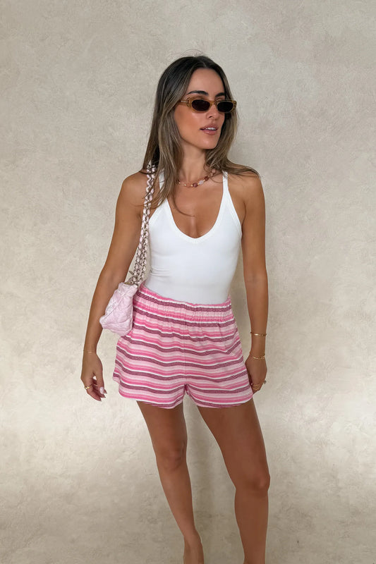 Aria Tank White by Sneaky Link – a sculpting stretch tank with smooth seamless feel. Perfect for flattering everyday wear.