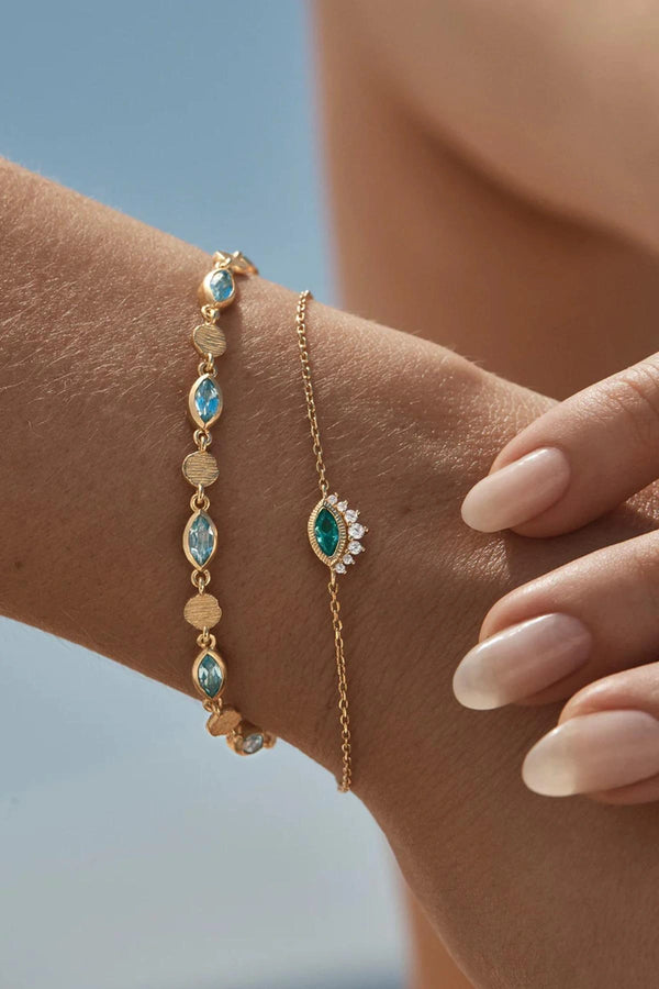18k Gold Vermeil Hope And Protection Bracelet by By Charlotte, adjustable evil eye bracelet with blue Paraiba gemstone and cubic zirconias.
