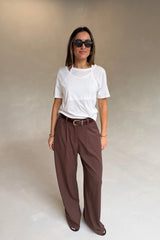 Kinsley Pinstripe Tailored Pant in chocolate with thin vertical white stripes and a slim, tailored fit.