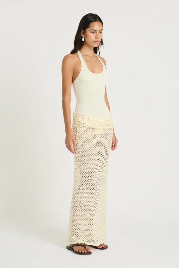 Ariel Maxi Dress Marshmallow by Benni, scoop-neck stretch bodysuit with racerback and cascading sequin cowl skirt for sleek, shimmering elegance.