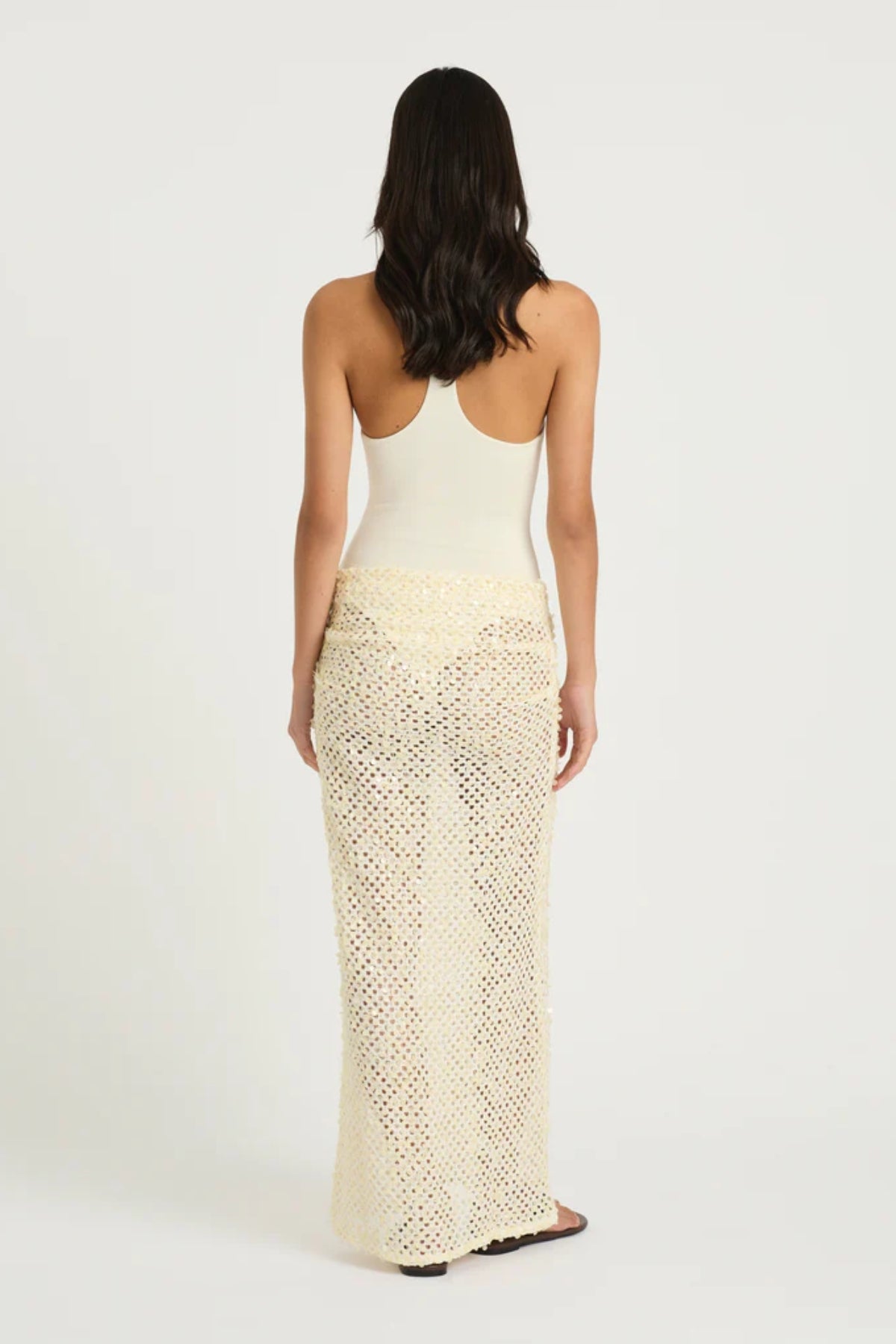 Ariel Maxi Dress Marshmallow by Benni, scoop-neck stretch bodysuit with racerback and cascading sequin cowl skirt for sleek, shimmering elegance.