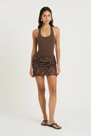 Ariel Mini Dress Cocoa by Benni, stretch scoop-neck bodysuit with racerback and draped sequin cowl skirt, a sleek trendy mini perfect for statement events.