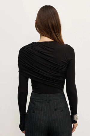 Ariya Bodysuit Shadow by Bayse – draped long sleeve bodysuit with asymmetric detailing and sculpted fit.