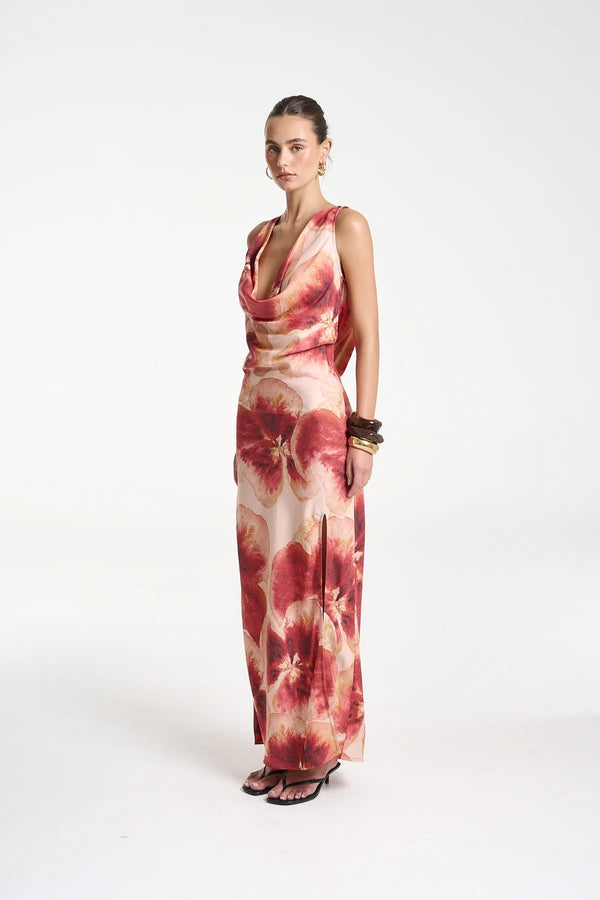 Ash Maxi Dress by Summi Summi — a bias-cut Aloha-print maxi with a cowl neckline and low tie-back, perfect for elegant warm-weather styling.