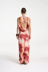 Ash Maxi Dress by Summi Summi — a bias-cut Aloha-print maxi with a cowl neckline and low tie-back, perfect for elegant warm-weather styling.