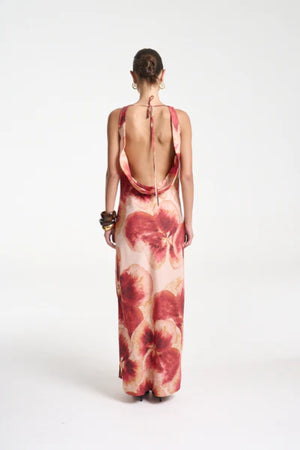 Ash Maxi Dress by Summi Summi — a bias-cut Aloha-print maxi with a cowl neckline and low tie-back, perfect for elegant warm-weather styling.