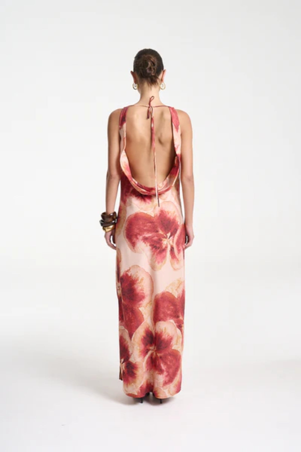 Ash Maxi Dress by Summi Summi — a bias-cut Aloha-print maxi with a cowl neckline and low tie-back, perfect for elegant warm-weather styling.