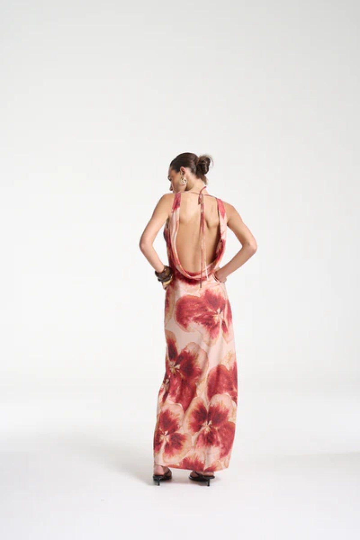 Ash Maxi Dress by Summi Summi — a bias-cut Aloha-print maxi with a cowl neckline and low tie-back, perfect for elegant warm-weather styling.