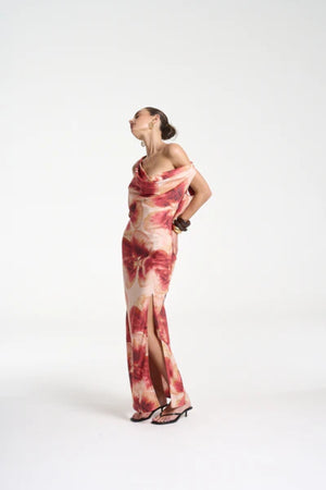 Ash Maxi Dress by Summi Summi — a bias-cut Aloha-print maxi with a cowl neckline and low tie-back, perfect for elegant warm-weather styling.