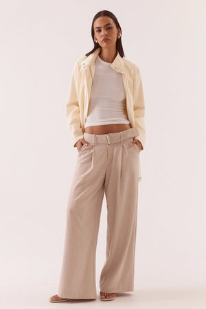 Asha Jacket Pannacotta by Sovere – relaxed cotton jacket with stand collar and adjustable belt detailing.