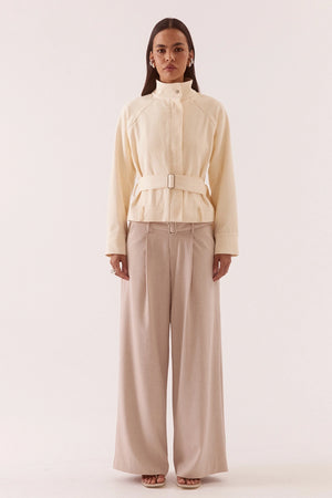 Asha Jacket Pannacotta by Sovere – relaxed cotton jacket with stand collar and adjustable belt detailing.