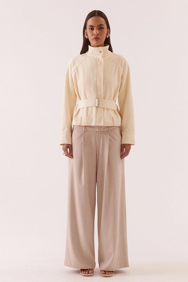 Asha Jacket Pannacotta by Sovere – relaxed cotton jacket with stand collar and adjustable belt detailing.