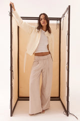 Asha Jacket Pannacotta by Sovere – relaxed cotton jacket with stand collar and adjustable belt detailing.