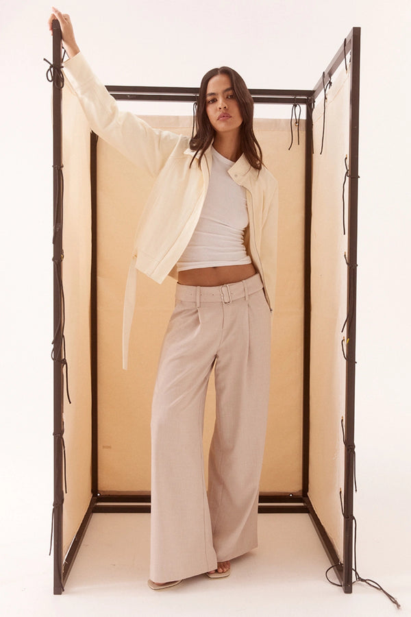Asha Jacket Pannacotta by Sovere – relaxed cotton jacket with stand collar and adjustable belt detailing.