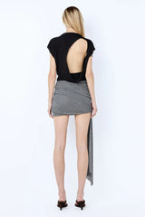 Astra Drape Mini Skirt by Bec + Bridge, a shimmering embellished knit mini with asymmetric gathers and a draped sash—perfect for chic summer styling.