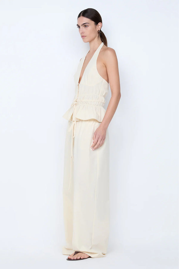 Astrid Halter Top by Bec and Bridge – an ivory halter top with a gathered waist and adjustable drawstring, perfect for polished holiday styling.