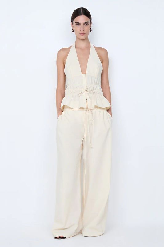 Astrid Wide Leg Pant by Bec + Bridge, a soft ecru tailored pant with faux drawstring detail and relaxed wide-leg fit for refined summer styling.