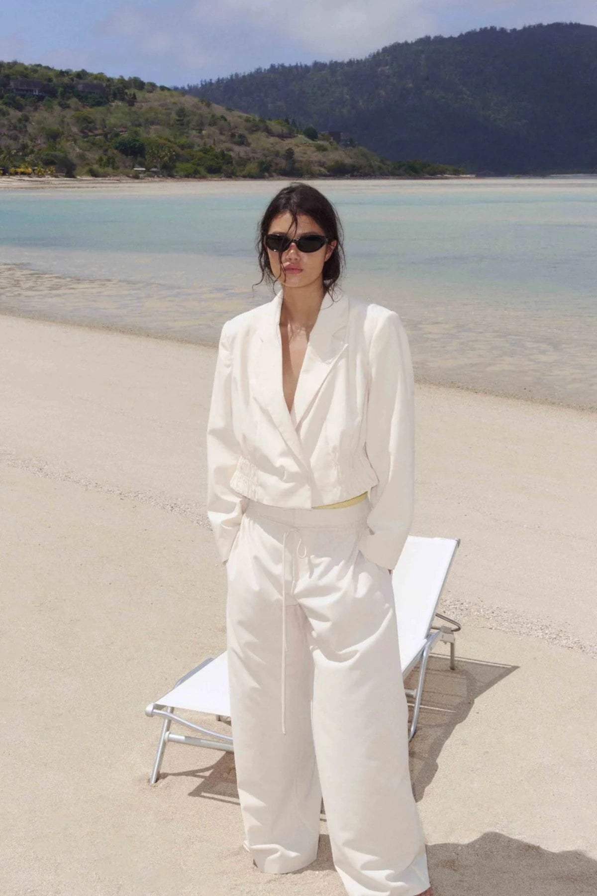 Astrid Wide Leg Pant by Bec + Bridge, a soft ecru tailored pant with faux drawstring detail and relaxed wide-leg fit for refined summer styling.