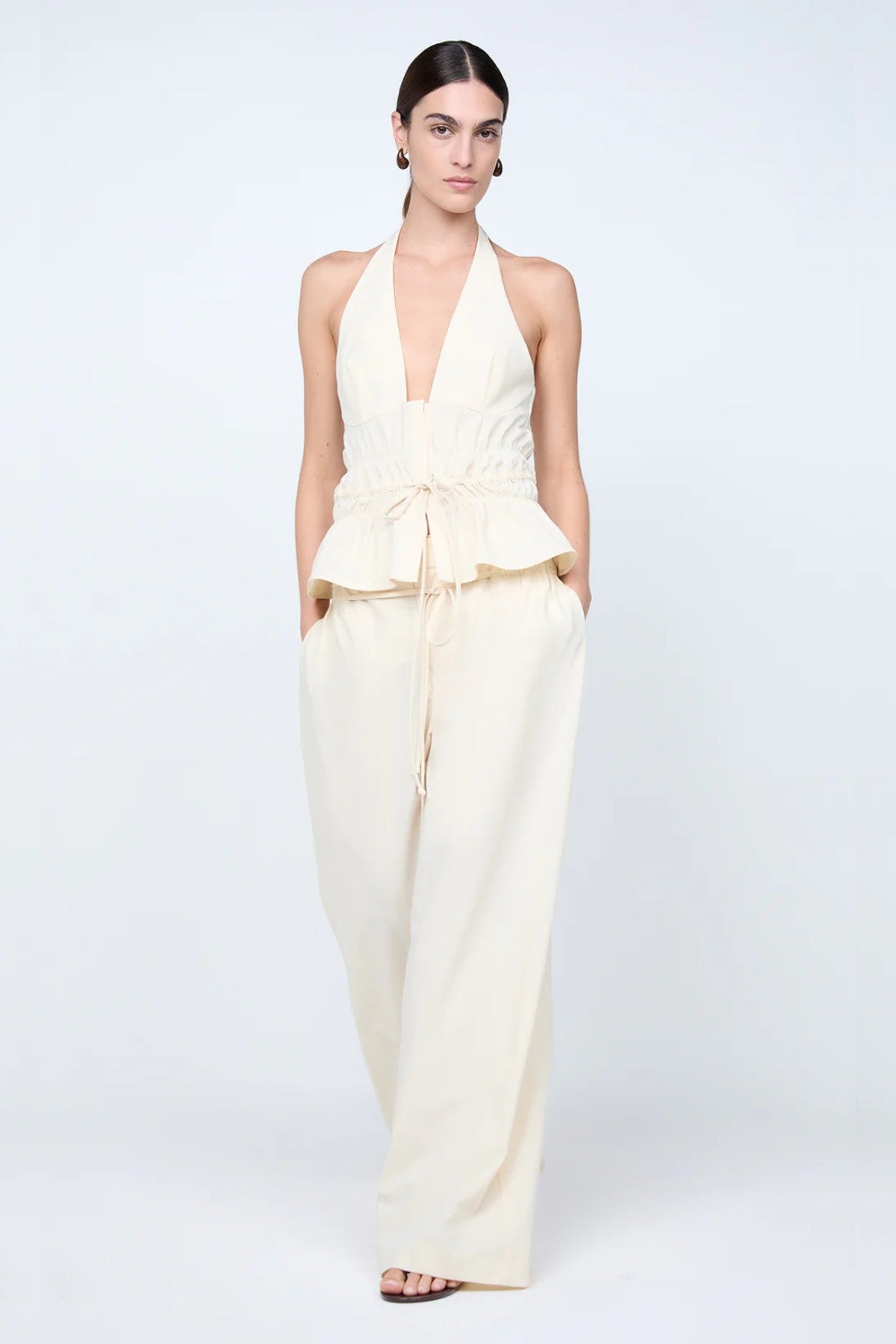Astrid Wide Leg Pant by Bec + Bridge, a soft ecru tailored pant with faux drawstring detail and relaxed wide-leg fit for refined summer styling.