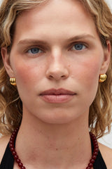 Aurelia Earrings Gold by Heaven Mayhem – ribbed gold stud earrings in 18K PVD plated stainless steel.