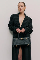 Austenne Bag Black by Reh Studios – genuine leather shoulder bag with structured silhouette and adjustable strap for everyday styling.