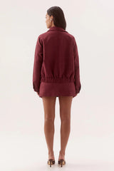 Avery Bomber Cranberry by Sovere, faux suede bomber jacket with relaxed fit for elevated winter layering.