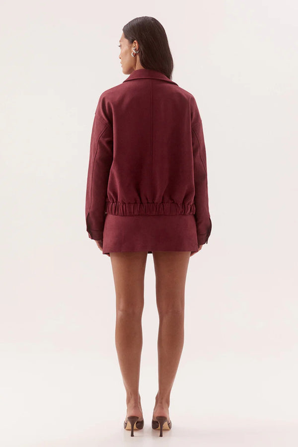 Avery Bomber Cranberry by Sovere, faux suede bomber jacket with relaxed fit for elevated winter layering.