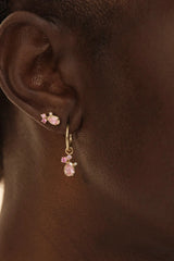 Awaken Love Hoops by By Charlotte – 18k gold vermeil hoop earrings with removable pink cubic zirconia cluster pendants.