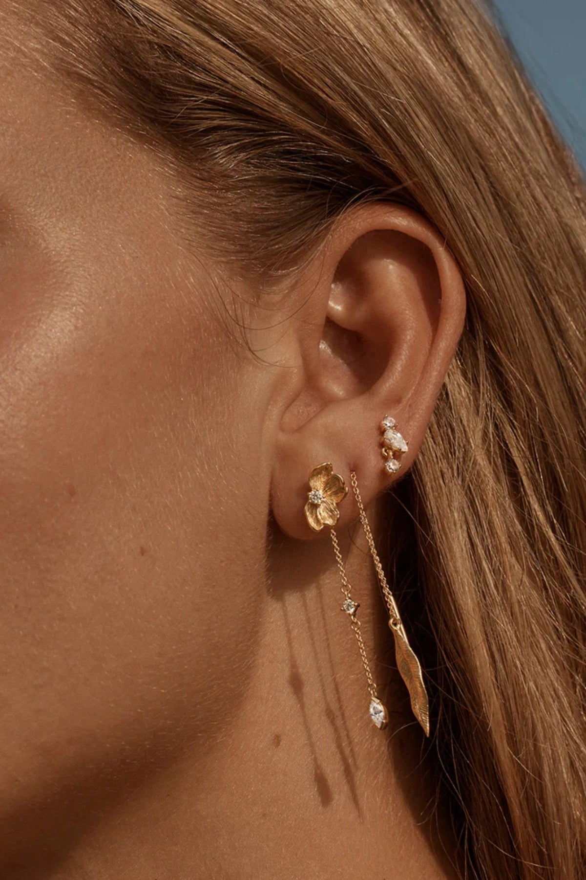 Awaken Thread Earrings by By Charlotte, gold vermeil thread-through design with leaf pendants, a trendy piece perfect for layering or meaningful gifting.