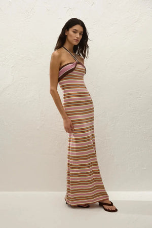 Axel Maxi Dress in Luis Stripe Dusty Mauve by Faithfull the Brand, a halter knit dress in mauve and olive tones. Perfect for warm-weather getaways.