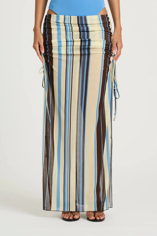 Ayla Maxi Skirt by Benni, ocean stripe sheer mesh maxi with adjustable drawstring sides, low-rise fit and asymmetric ruching.