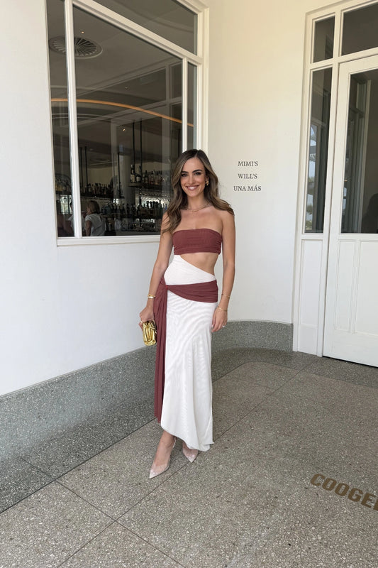 Ayla Strapless Dress by Bec and Bridge — a rust and butter cream spliced strapless dress with a marble ring cutout, perfect for evening events.