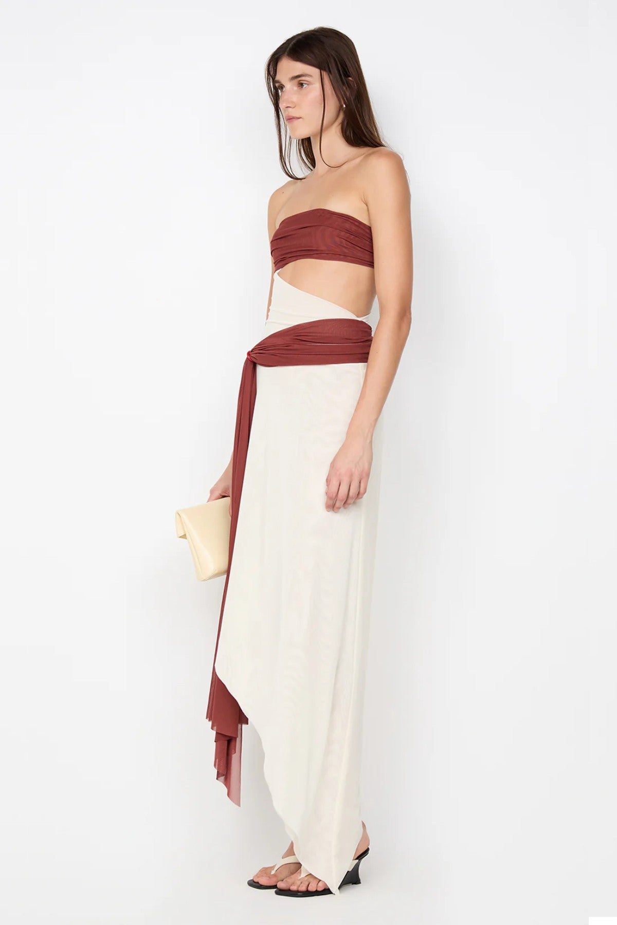 Ayla Strapless Dress by Bec and Bridge — a rust and butter cream spliced strapless dress with a marble ring cutout, perfect for evening events.