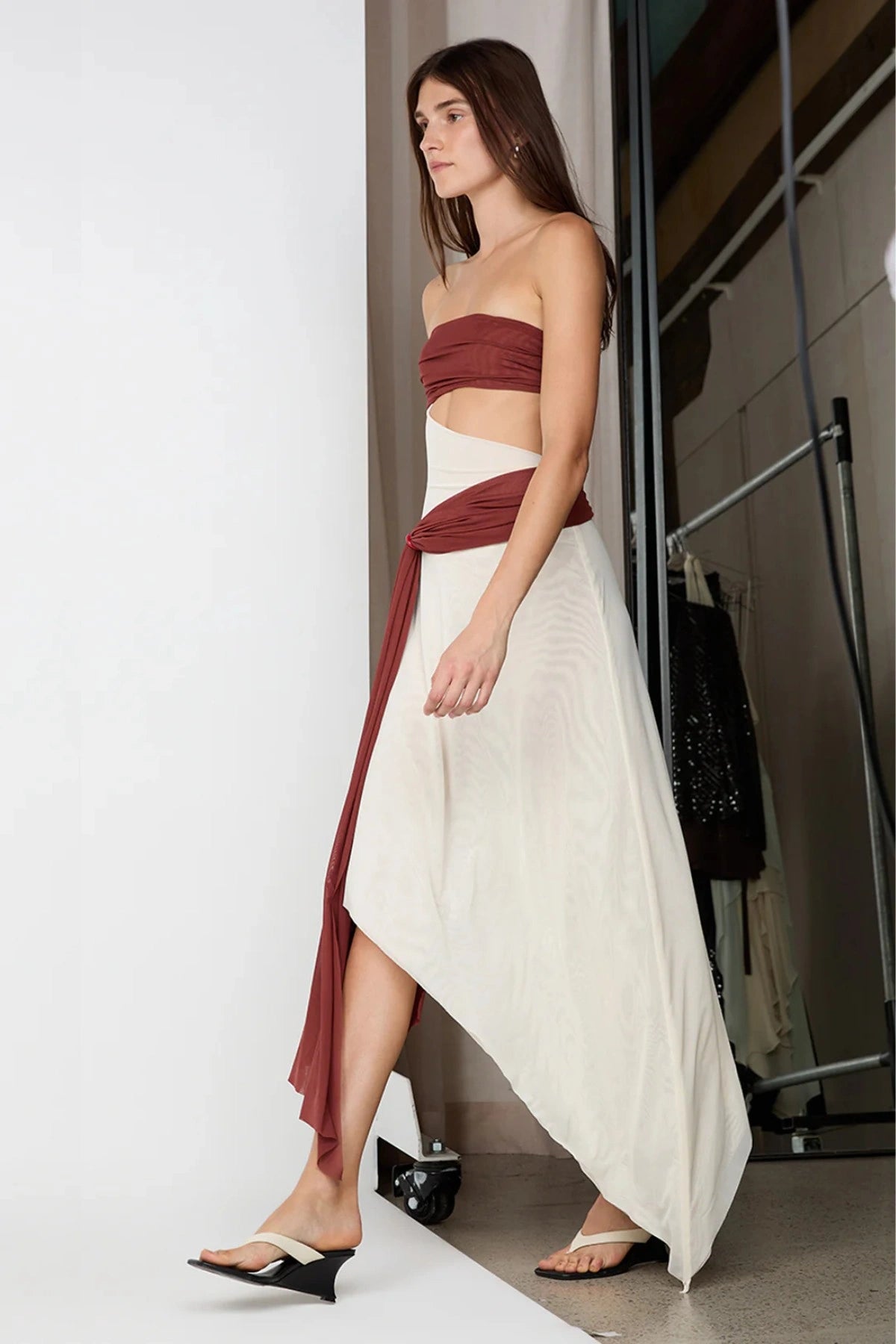 Ayla Strapless Dress by Bec and Bridge — a rust and butter cream spliced strapless dress with a marble ring cutout, perfect for evening events.